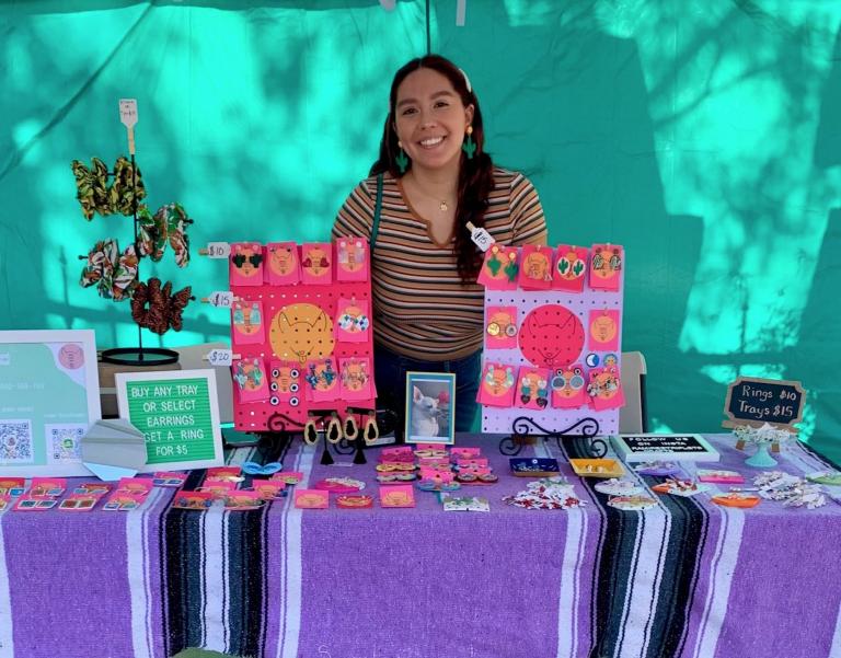 Alexianne promoting her side business of hand made earrings.